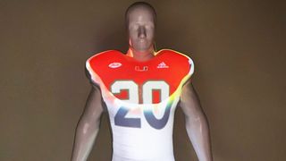 University of Miami football uniforms are 3D projection-mapped onto larger-than-life statues to showcase the team’s many looks over the years.