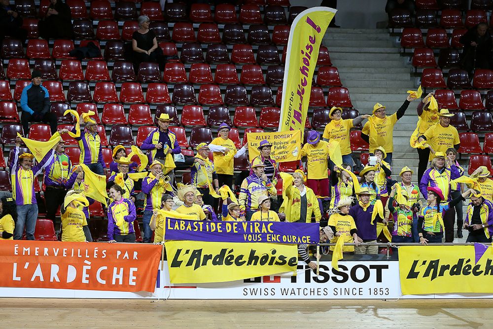 Fans cheer Robert Marchand during his attempt to break the 105+ world cycling hour record.