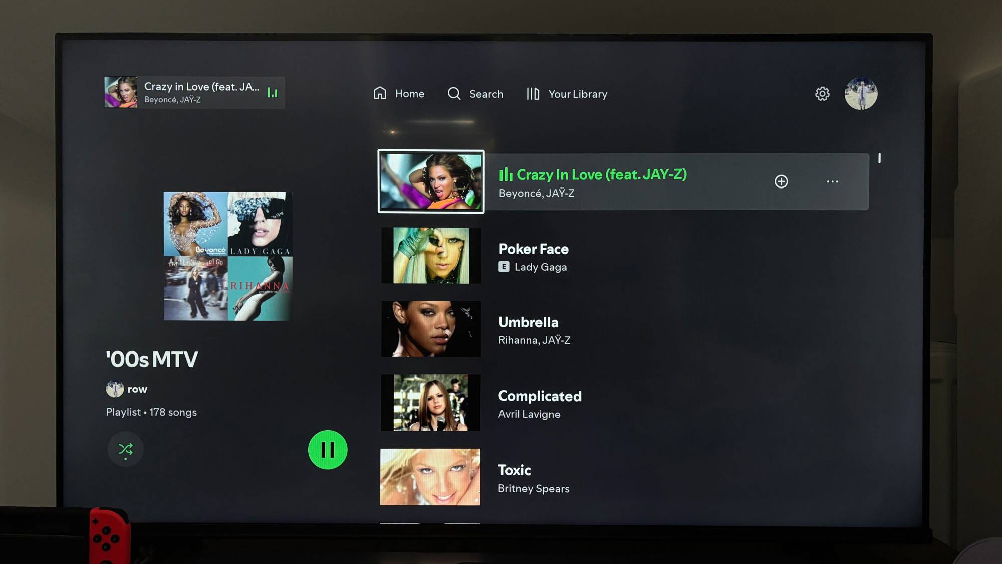 A music video playlist on the Spotify smart TV app