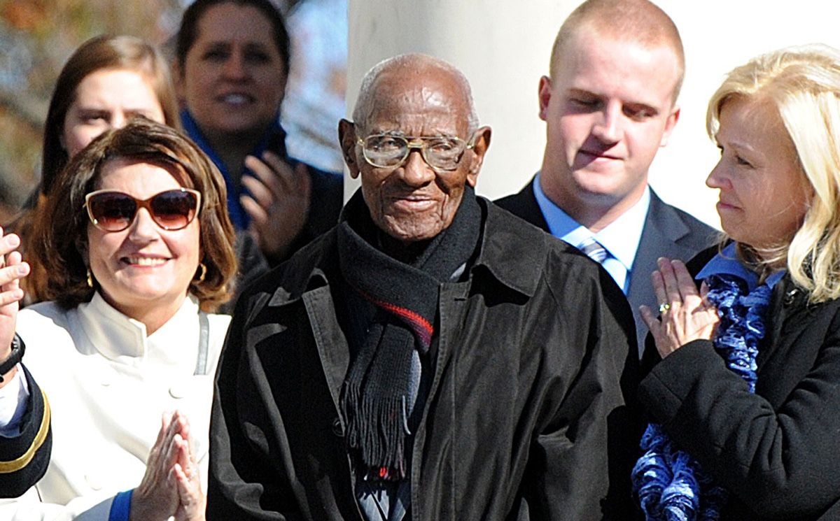 Richard Overton, who is considered America&#039;s oldest living veteran, is honored by President Barack Obama during a ceremony for veterans at the Tomb of the Unknowns on Veterans Day at Arlington National Cemetery on Nov. 11, 2013. He was 107 years old at th