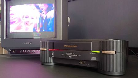 Panasonic 3DO plugged into Sony Trinitron CRT TV with Road Rash cutscene on screen.