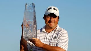 Tim Clark holding the trophy after winning the Players Championship in 2010