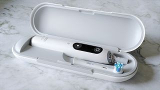 Oral-B iO Series 9 electric toothbrush in charging case