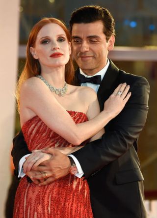 Jessica Chastain and Oscar Isaac on the red carpet of the movie "Scenes From a Marriage at the Venice Film Festival