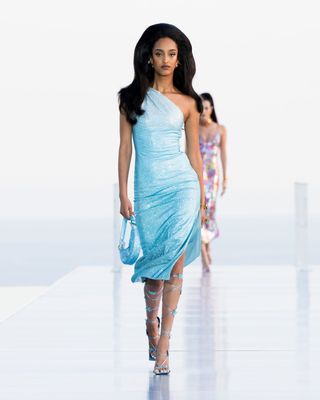 Dua Lipa x Versace, model walking runway in Cannes