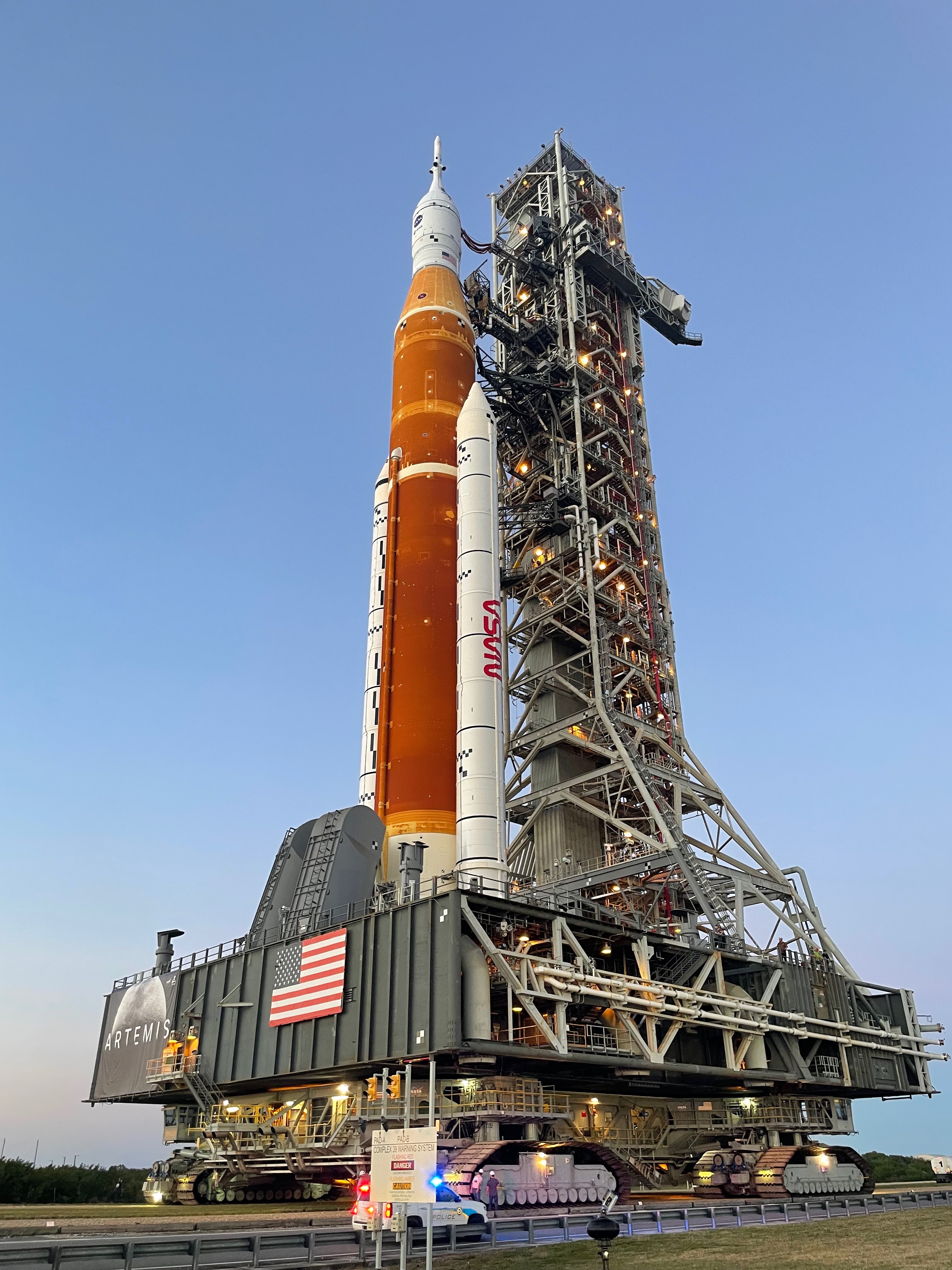 The Artemis 1 stack is being hauled to the pad by NASA's crawler-transporter 2, one of the largest vehicles every built. CT-2 was constructed in 1965 to support NASA's Apollo moon program and has been modified over the past few years to serve Artemis.
