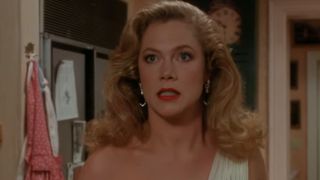 A close up of Kathleen Turner looking very mad in The War Of The Roses