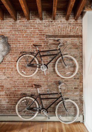 bike storage on a wall in an apartment