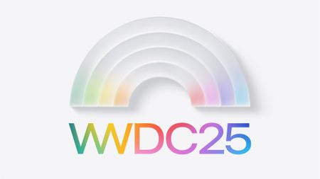 The WWDC 2025 logo, which shows "WWDC 2025" colored with a rainbow gradient and a glass-looking rainbow above the text that is slowly filling with color.