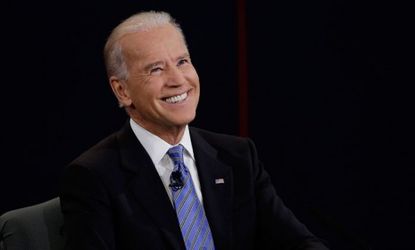Vice President Joe Biden shows of those distractingly pearly whites.