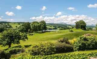 Mandatory Credit: Photo by Sotheby'sRealty/Bournemouth/REX/Shutterstock (5490187g) View from Ees Wyke Beatrix Potter holiday home up for sale, Ambleside, Cumbria, Britain - Dec 2015 *Full story: http://www.rexfeatures.com/nanolink/rptm The holiday home that inspired a young Beatrix Potter to draw and paint wild animals has gone on the market for £1.25m. Ees Wyke is a magnificent country house that was rented by the children's author's London-based parents in the summer holidays. It was said a teenage Beatrix used the Lake District scenery surrounding the Georgian property to indulge her interest in exploring and drawing wildlife. Her explorations at the 12-bedroom house are thought to have sparked her successful commercial career, which began after she sold a series of rabbit pictures as Christmas card designs aged 24. One of her most popular books - The Tale of Peter Rabbit - was published a decade later in 1902. Ees Wyke was also the property that made Potter fall in love with the Lake District. She later bought Hill Top Farm, which was just a quarter of a mile away in Near Sawrey by Lake Esthwaite.