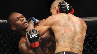 Alex Pereira battles Israel Adesanya during their first Middleweight UFC fight