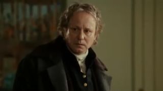 Stellan Skarsgard with a worried expression on his face in Goya's Ghosts