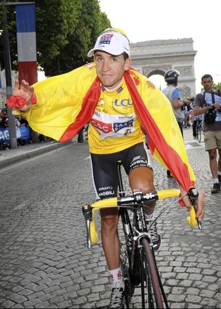 Sastre celebrates his Tour de France victory on the Champs Elysees