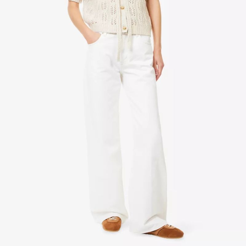 FRAME The Stroll Wide-Leg Denim Jeans on model