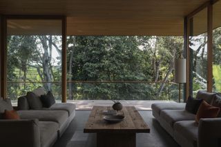 tsuki, a house by colvin haven in bali, set within green nature and made with wood and natural materials