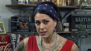 Danielle Colby in motorcycle shop on American Pickers