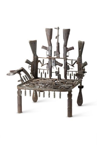 Gonçalo Mabunda's part-sculpture, part-design throne piece - a chair made out of weapons such as guns and pistols