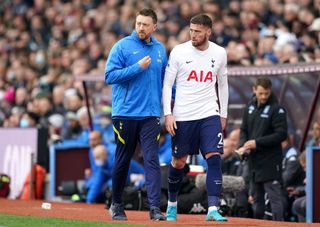 Matt Doherty, right, leaves the pitch for treatment during the Premier League match at Aston Villa