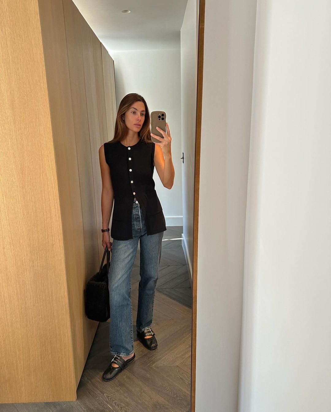 Jaime Ridge styles her jeans with a longline waistcoat