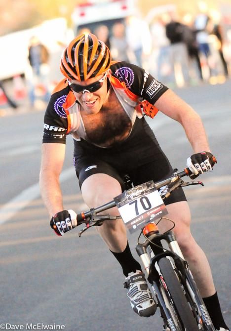 Kris Sneddon (Kona) coming through the start-finish area