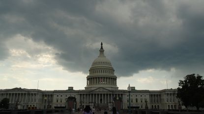 An approaching thunderstorm brings dark clouds to the U.S. Capitol in Washington, DC.