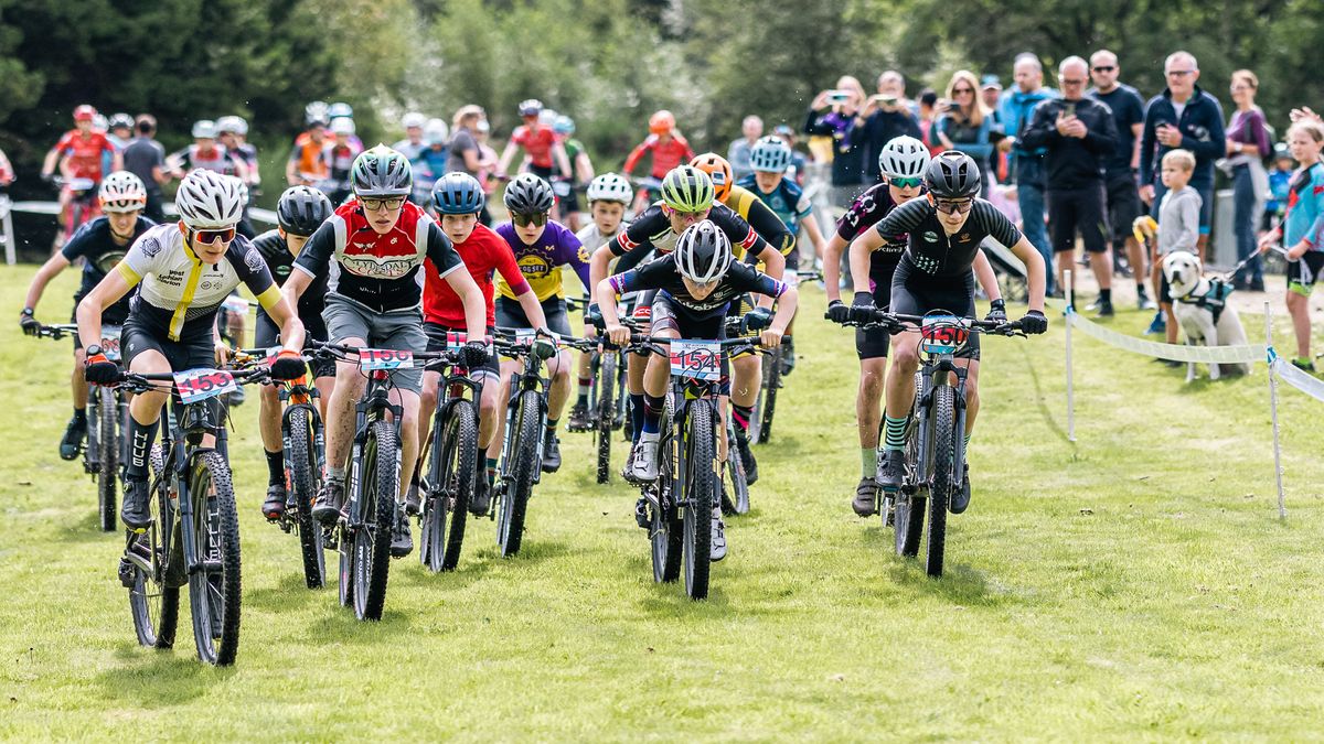 Youth mountain bikers at the start of a race