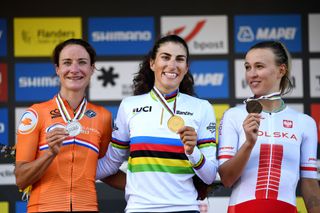 LEUVEN BELGIUM SEPTEMBER 25 LR Silver medalists Marianne Vos of Netherlands gold medalists Elisa Balsamo of Italy and bronze medalists Katarzyna Niewiadoma of Poland pose on the podium during the medal ceremony after the 94th UCI Road World Championships 2021 Women Elite Road Race a 1577km race from Antwerp to Leuven flanders2021 on September 25 2021 in Leuven Belgium Photo by Tim de WaeleGetty Images