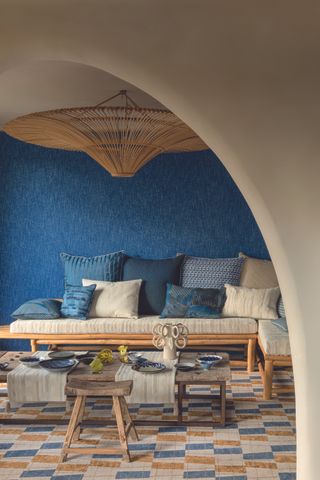 A bright blue natural fabric on the walls