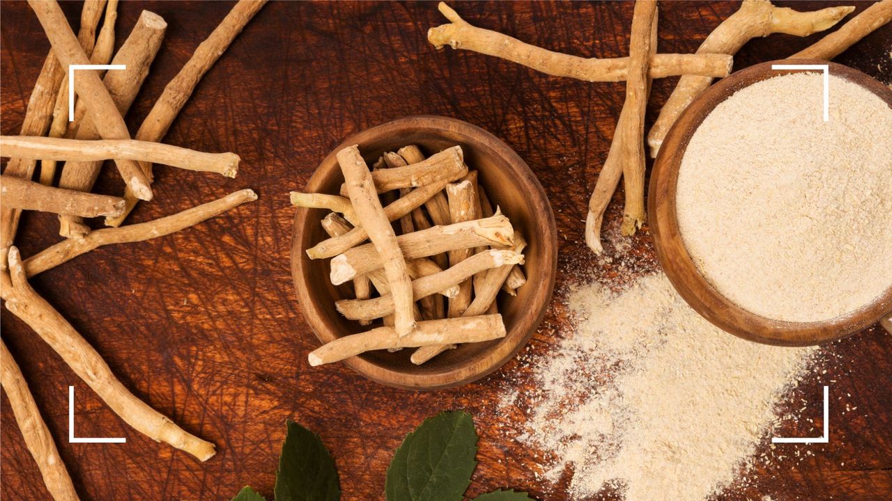 A collection of ashwagandha in root, powder and supplement form on dark wooden table, to illustrate what foods are adaptogens