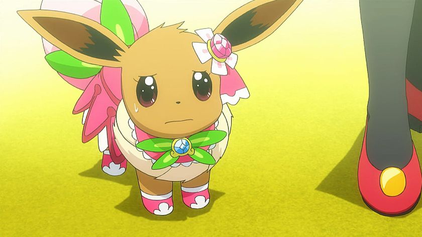 Eevee looks nervous in a costume in an episode of the Pokemon anime