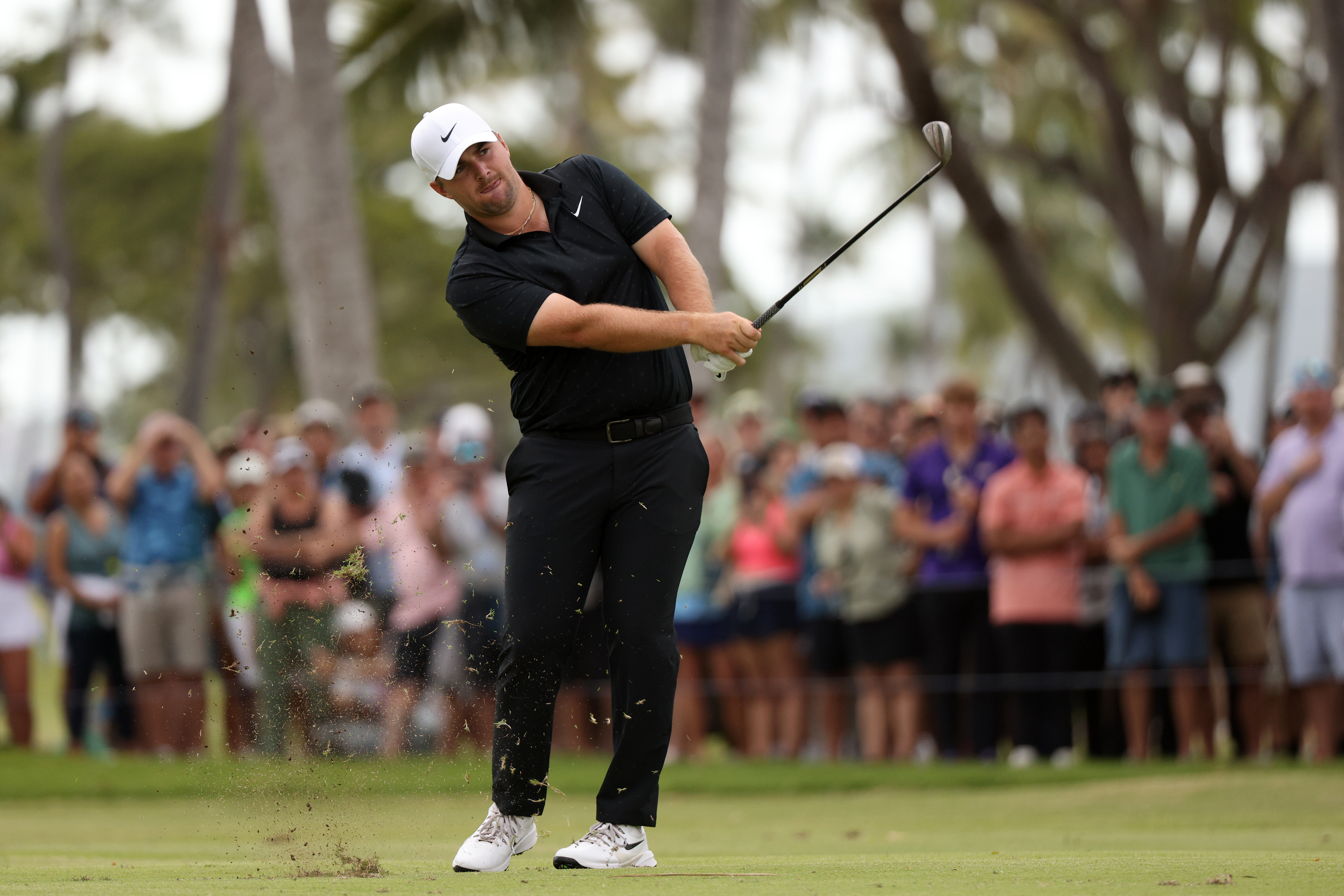 Chris Gotterup hits a chip shot