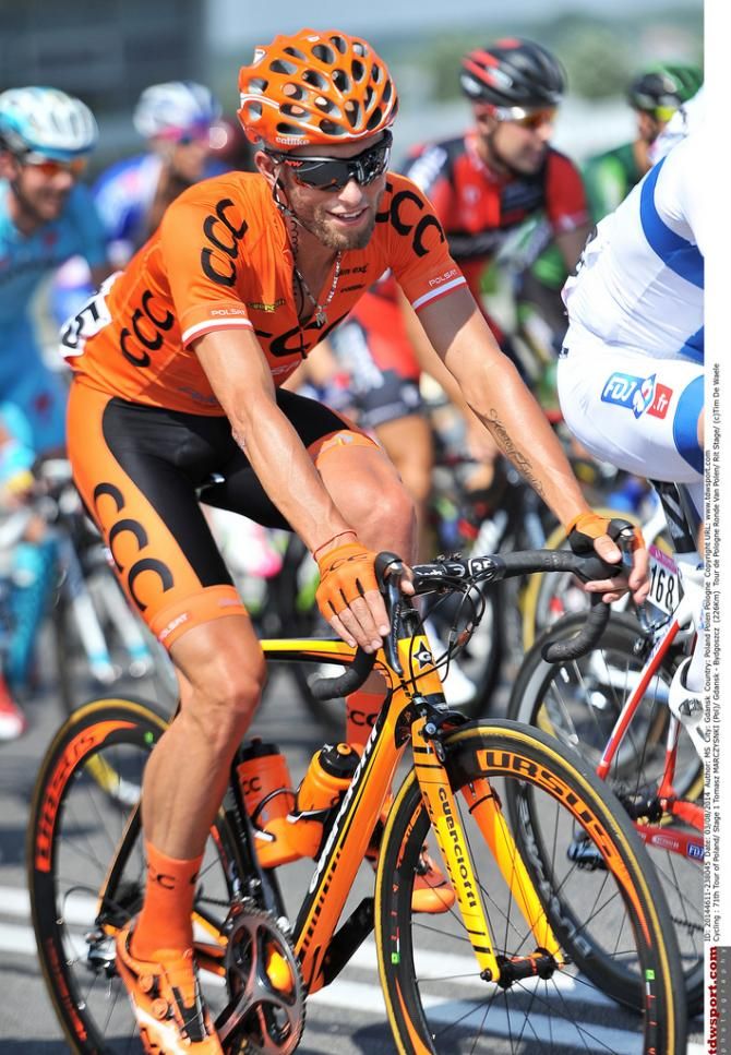 It's hard to miss Tomasz Marczyński in his orange CCC team kit