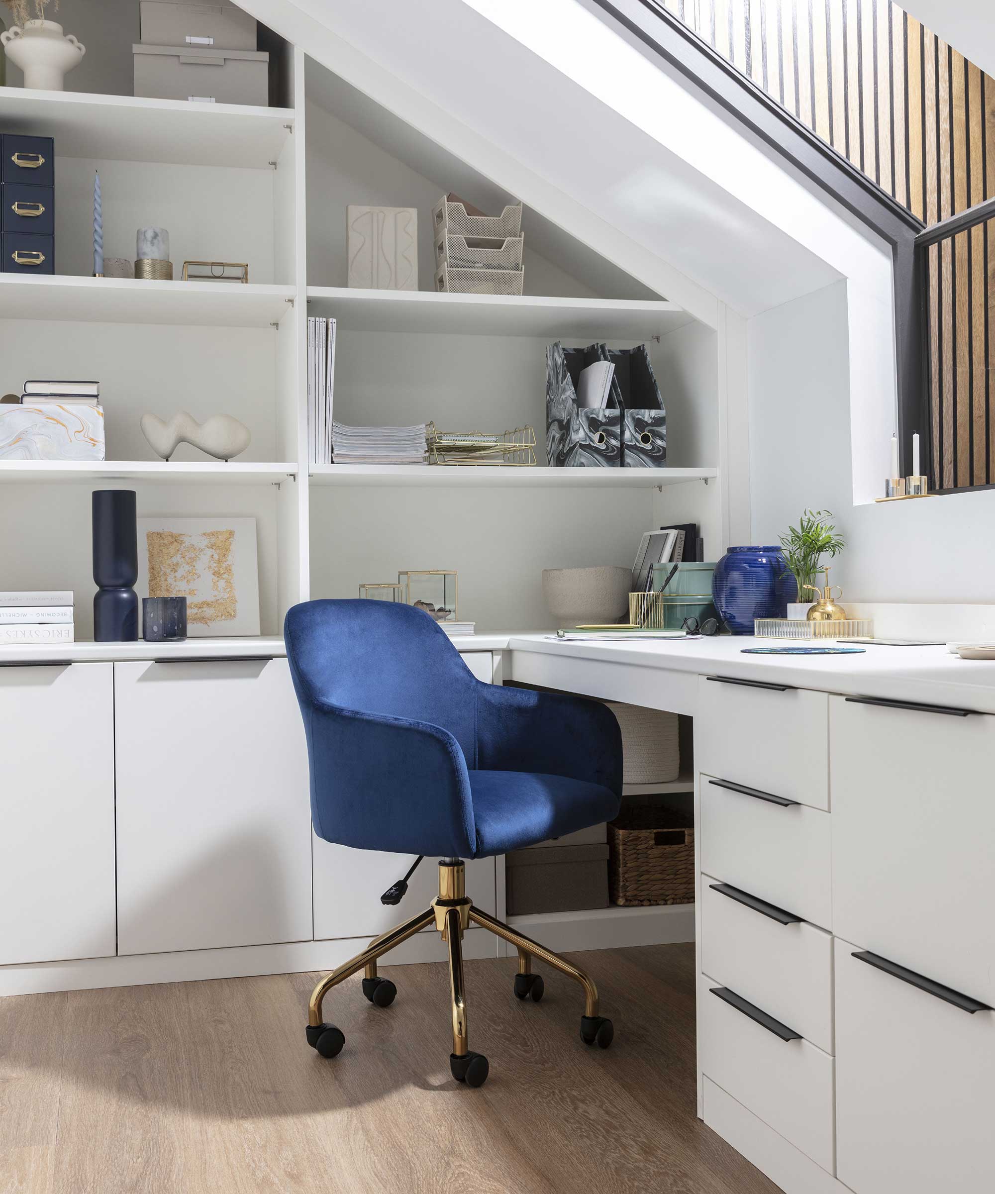 white loft conversion home office with built-in storage