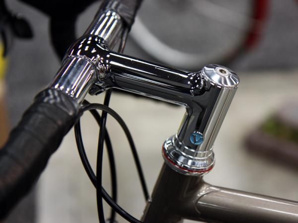 The fillet brazed stem on this Vanilla road bike features a nicely inset "V" and a neatly integrated clamp on the opposite side.
