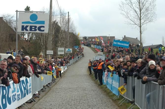 Eager fans await the Tour of Flanders peloton.