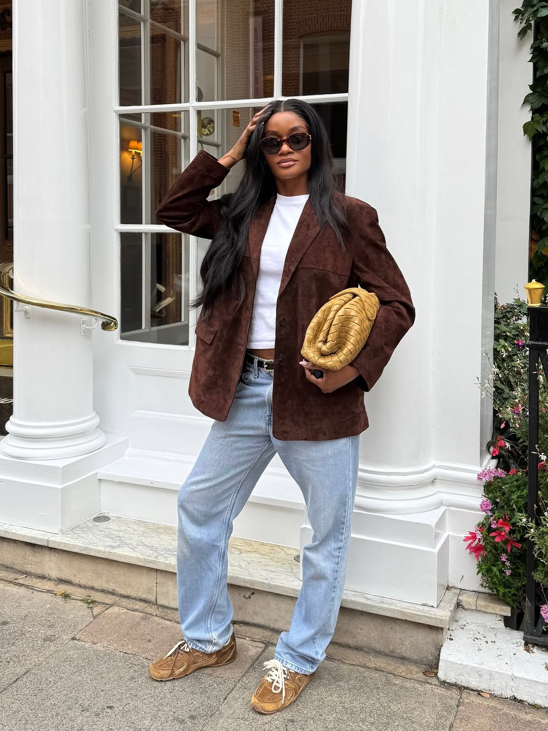 Mimi Orere wearing double lace trainers.