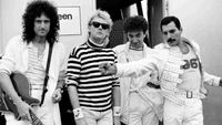 Queen performing onstage in Budapest in 1986