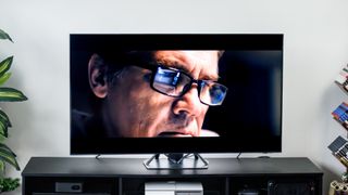 Samsung QN90F Neo QLED TV in a living room