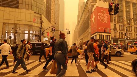 Shoppers in New York with orange air