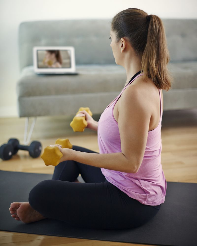A woman working out at home