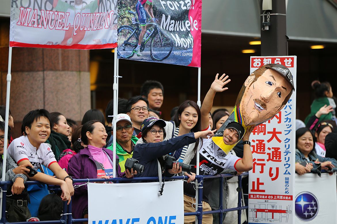 Japanese fans with a likeness of Fabian Cancellara