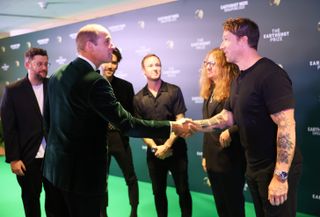 Prince William meeting the members of OneRepublic in Singapore