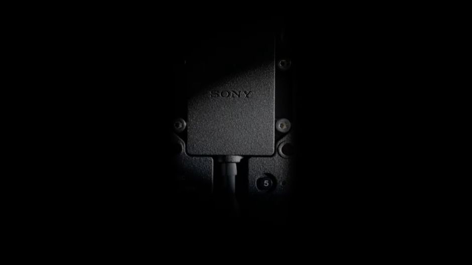 A screenshot of an odd black plug from the Sony teaser