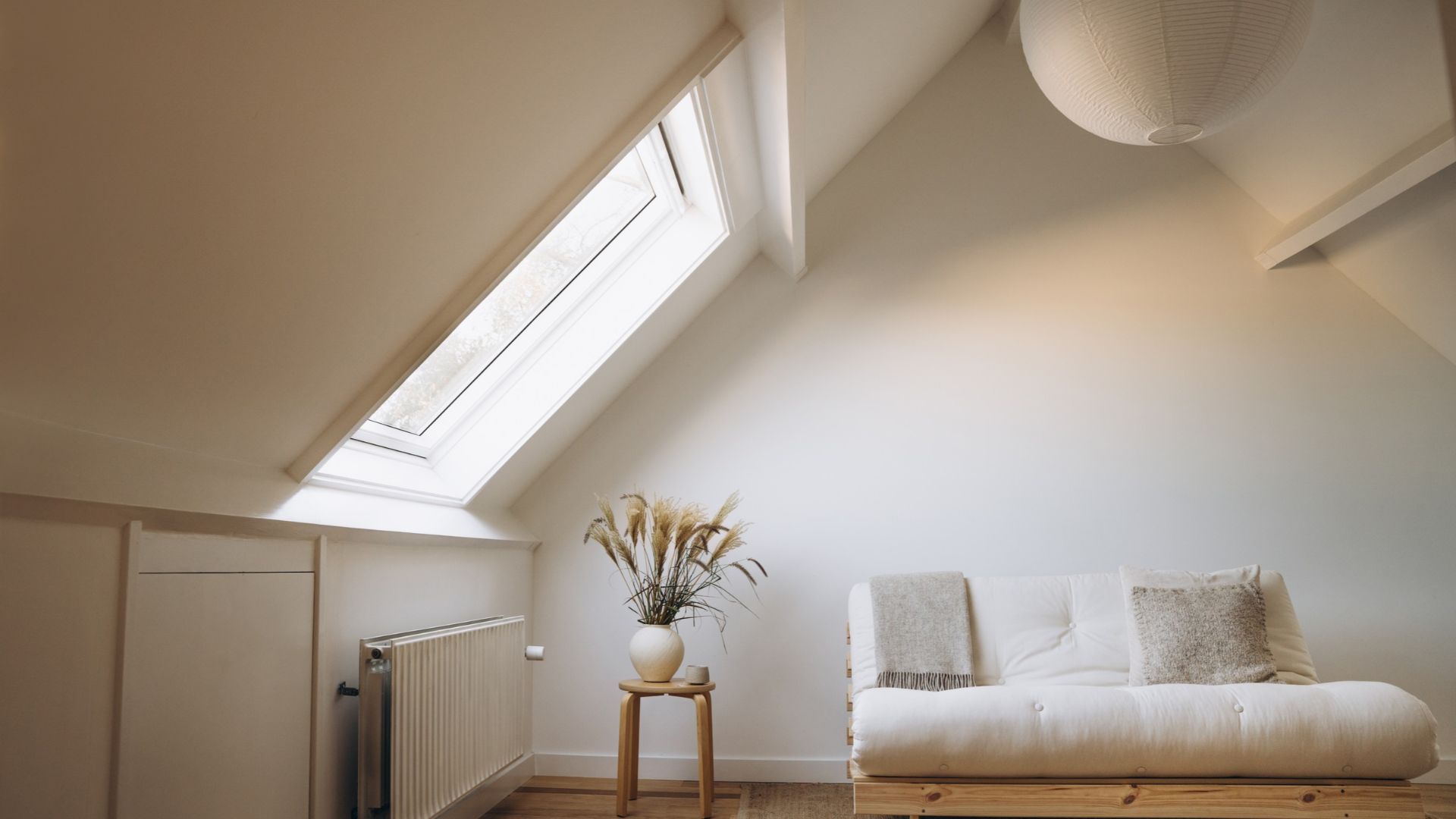 picture of all white room with minimalist furniture