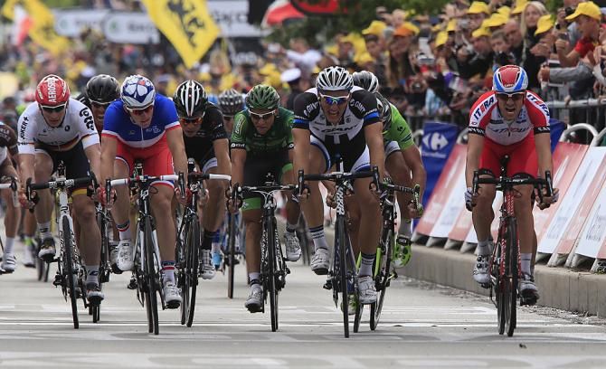 Marcel Kittel pushes ahead to win the stage