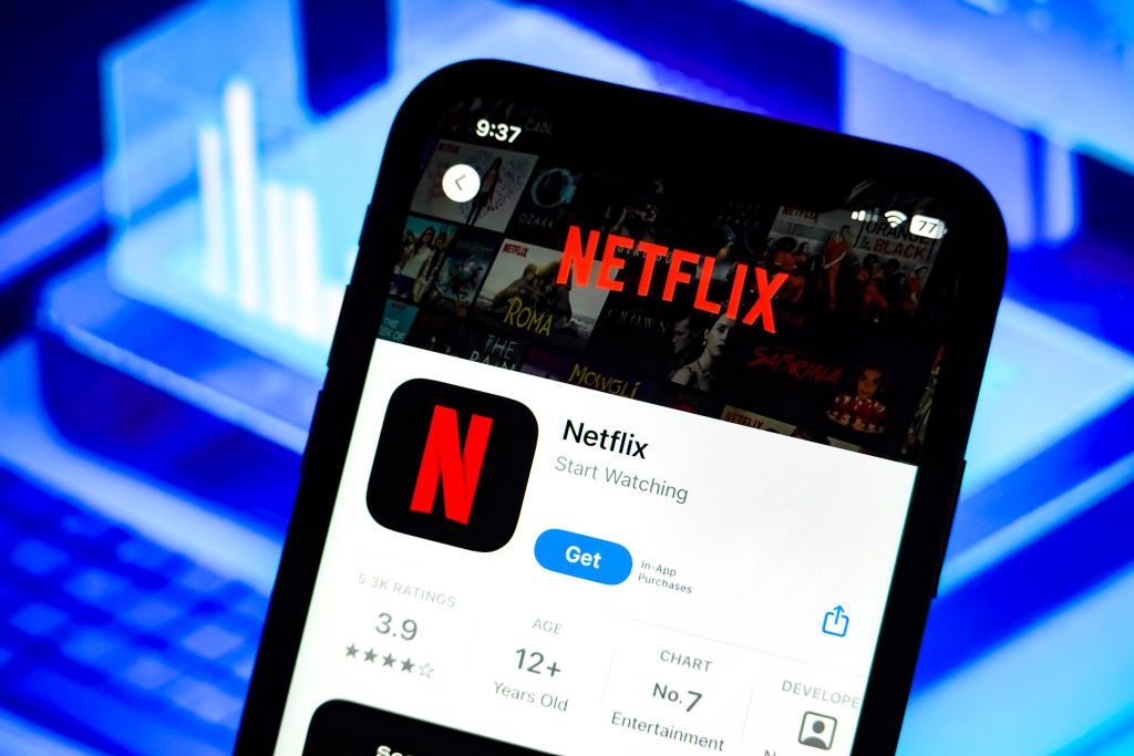 In this photo illustration, a Netflix app logo is displayed on an iPhone in the Apple Store