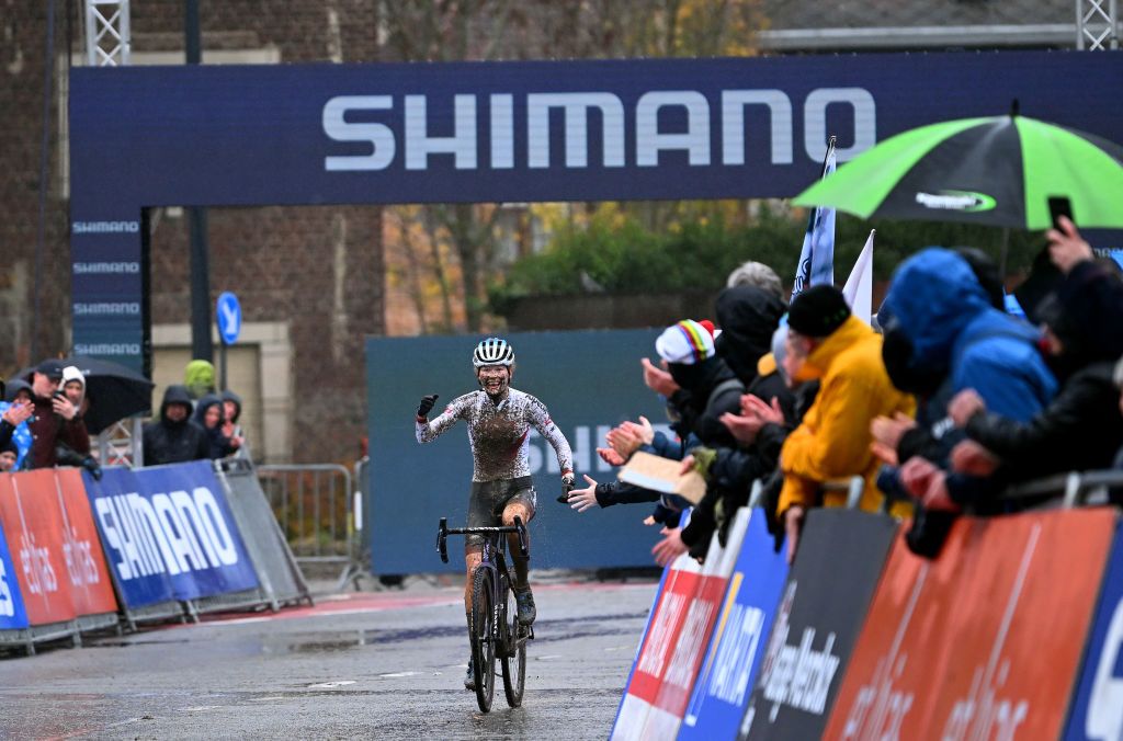 OVERIJSE BELGIUM NOVEMBER 20 Puck Pieterse of The Netherlands and Team Alpecin Deceuninck celebrates at finish line as race winner during the 62nd UCI Cyclocross World Cup Druivencross Overijse 2022 Womens Elite CXWorldCup Overijse Cyclocross on November 20 2022 in Overijse Belgium Photo by Luc ClaessenGetty Images