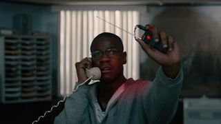 A still from the movie Breaking in which John Boyega's character Lance Corporal Brian Brown-Easley is holding a phone and a <a href='https://ryanreedykalamazoo.com/author/dns_d84zv53g' target='_blank'>small</a> device” loading=”lazy” data-original-mos=”https://cdn.mos.cms.futurecdn.net/8Gr5RWFcz2vvoUYh3jx8hZ.jpg” data-pin-media=”https://cdn.mos.cms.futurecdn.net/8Gr5RWFcz2vvoUYh3jx8hZ.jpg”></p>
</div>
</div><figcaption class=