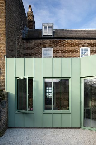 detail of rear extension with green cladding at The Saddlery